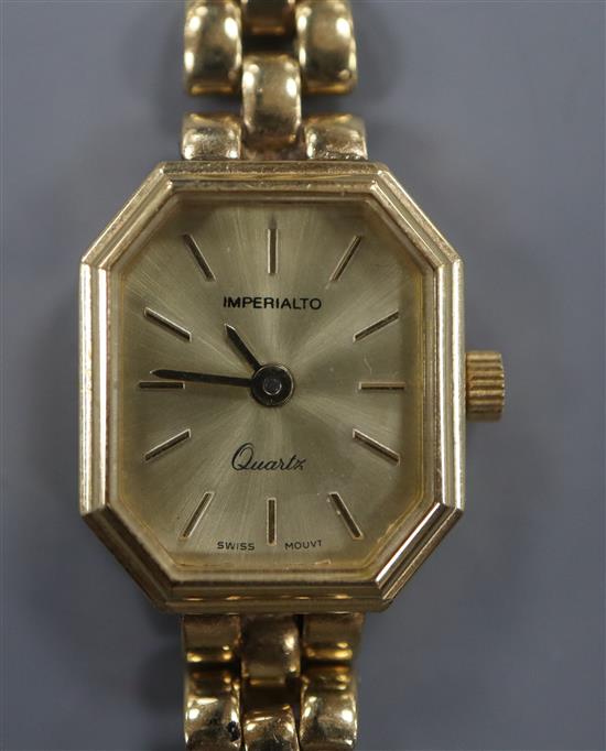 An Imperialto ladies 9ct gold quartz wristwatch on 9ct gold bracelet, gross 15 grams.